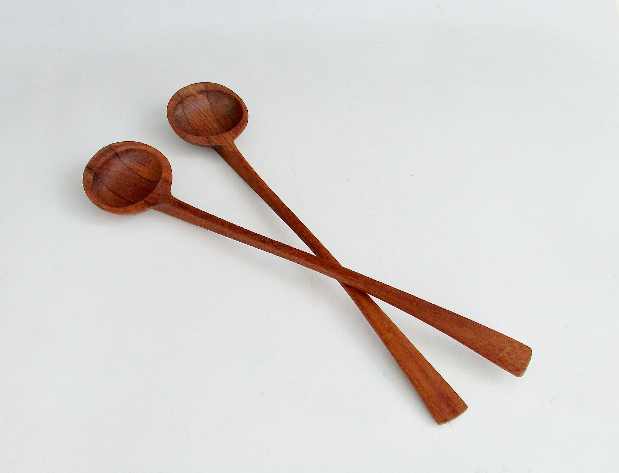 I have handled and seen a lot of Dansk salad servers . This pair is one of the more scarce designs . Stamped  Danmark with the JHQ signature initials . Very good condition . Expected patina no cracks or chips . 