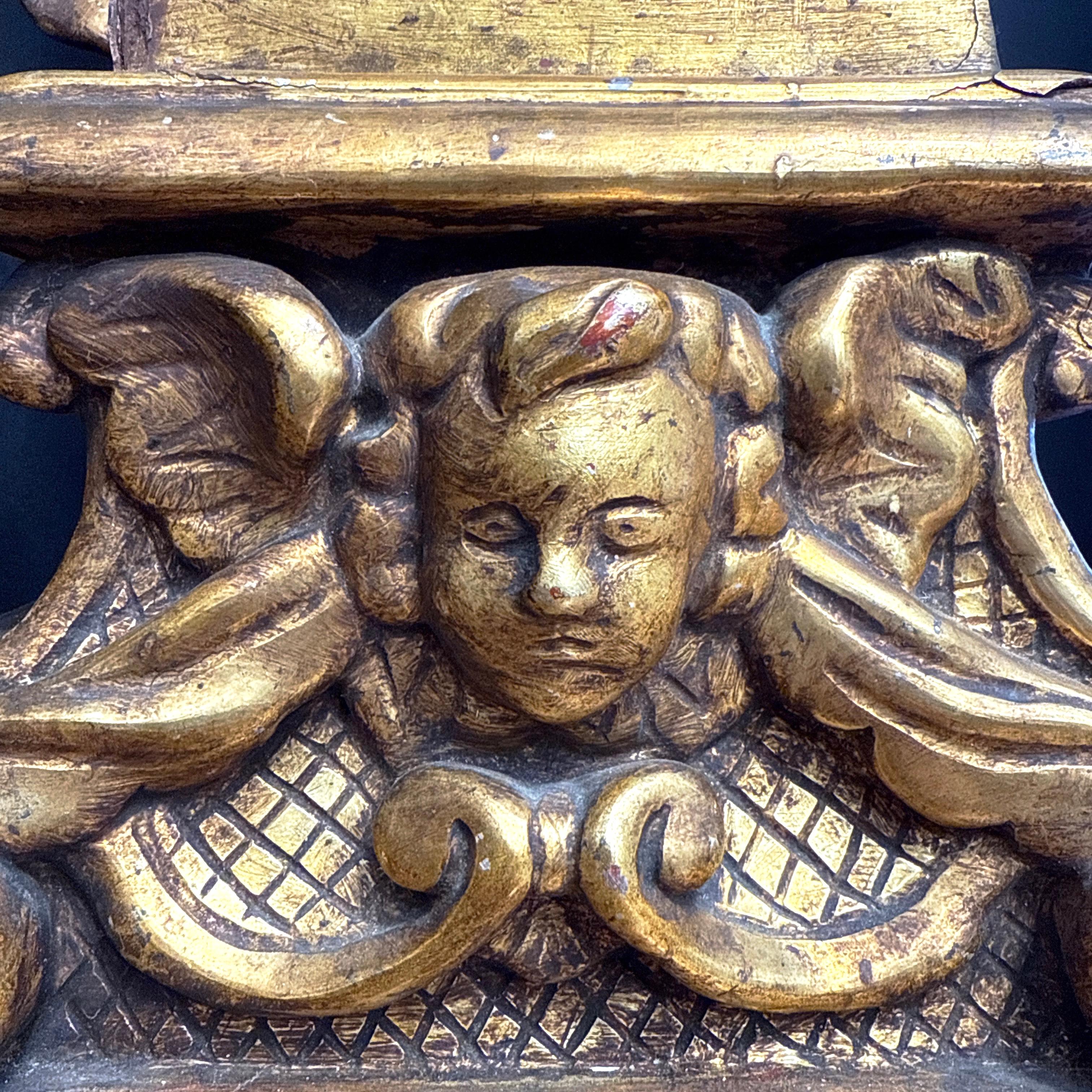 Legno Coppia di figure di cornucopia in legno dorato del primo barocco italiano settentrionale in vendita