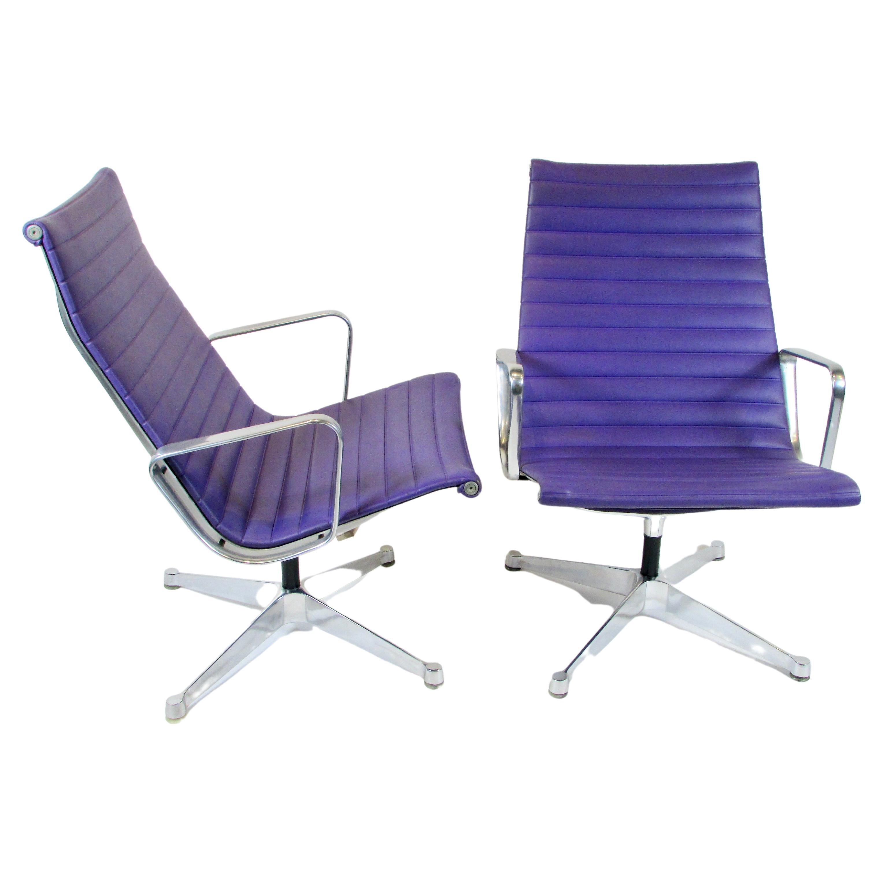 Pair of Early Base Eames Herman Miller Aluminum Group Swivel Lounge Chairs