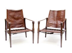 Pair Of Early British Roorkhee Safari Campaign Chairs In Leather, Circa 1920