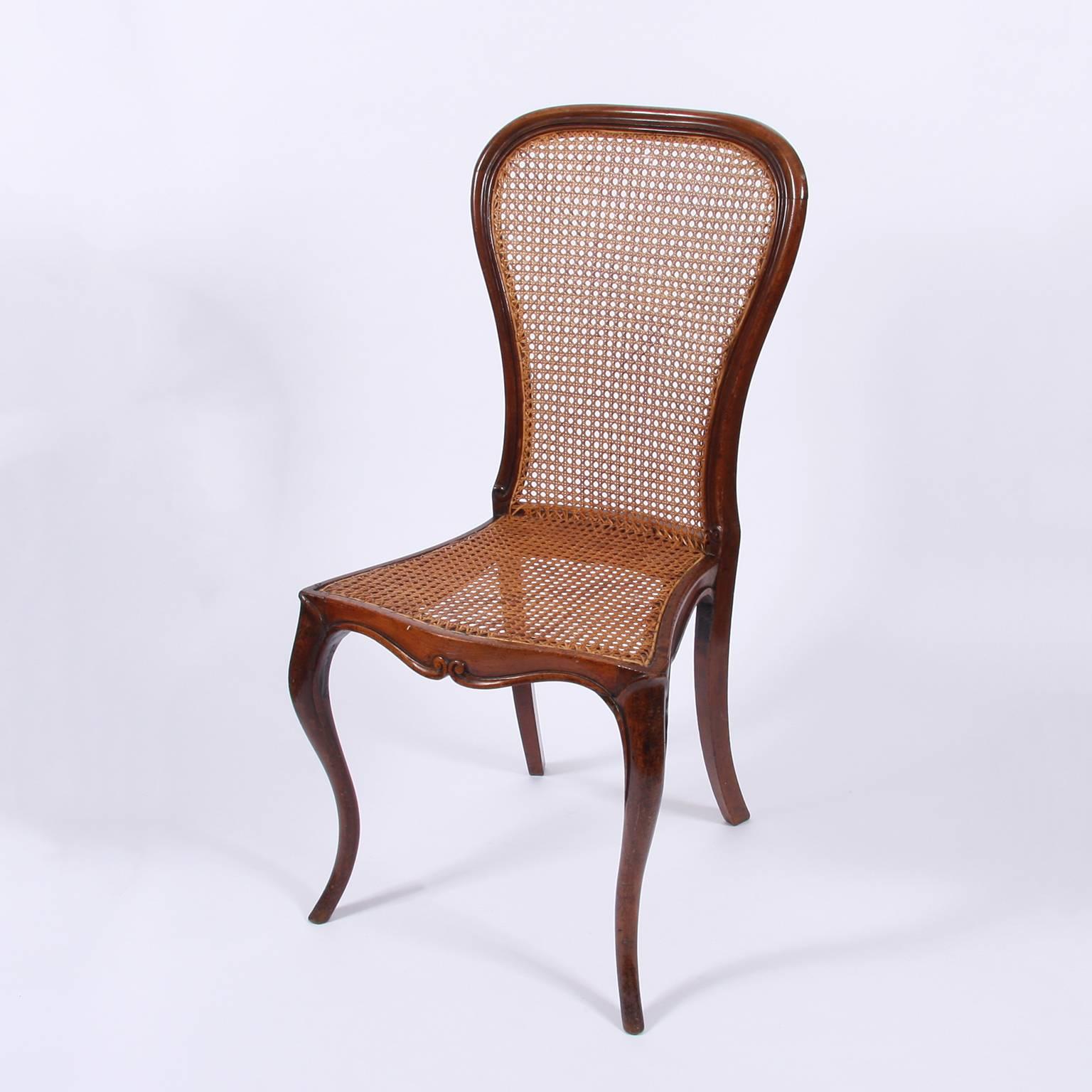 A gorgeous pair of walnut caned chairs with cabriole legs in fantastic condition.
 