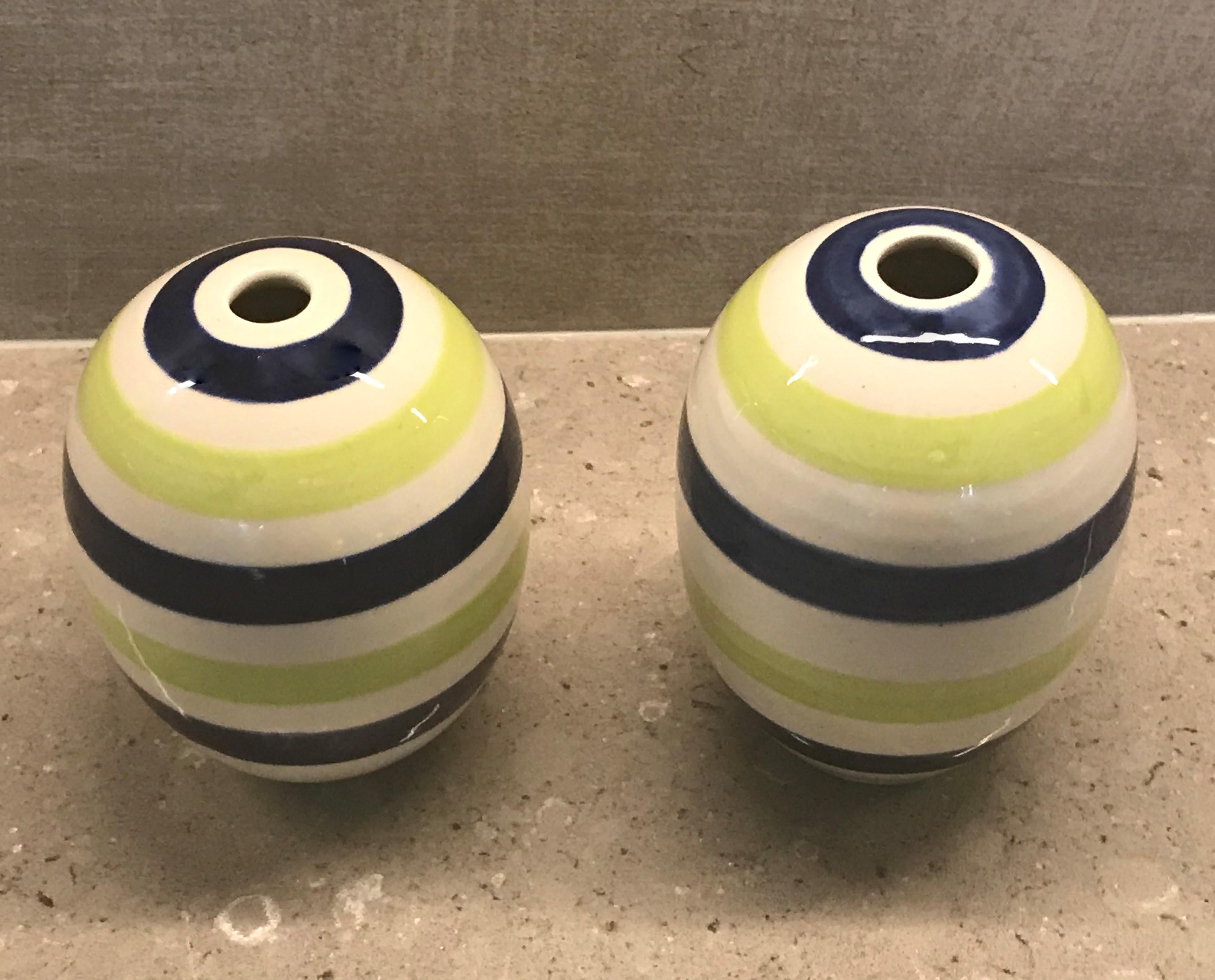 Reduced from $175.....Jonathan Adler exhibited his first ceramic collection in Barney's New York in 1993. In 1998 he opened his first boutique in SOHO New York. These two hand thrown striped bud vases are from one of his early collections in deep