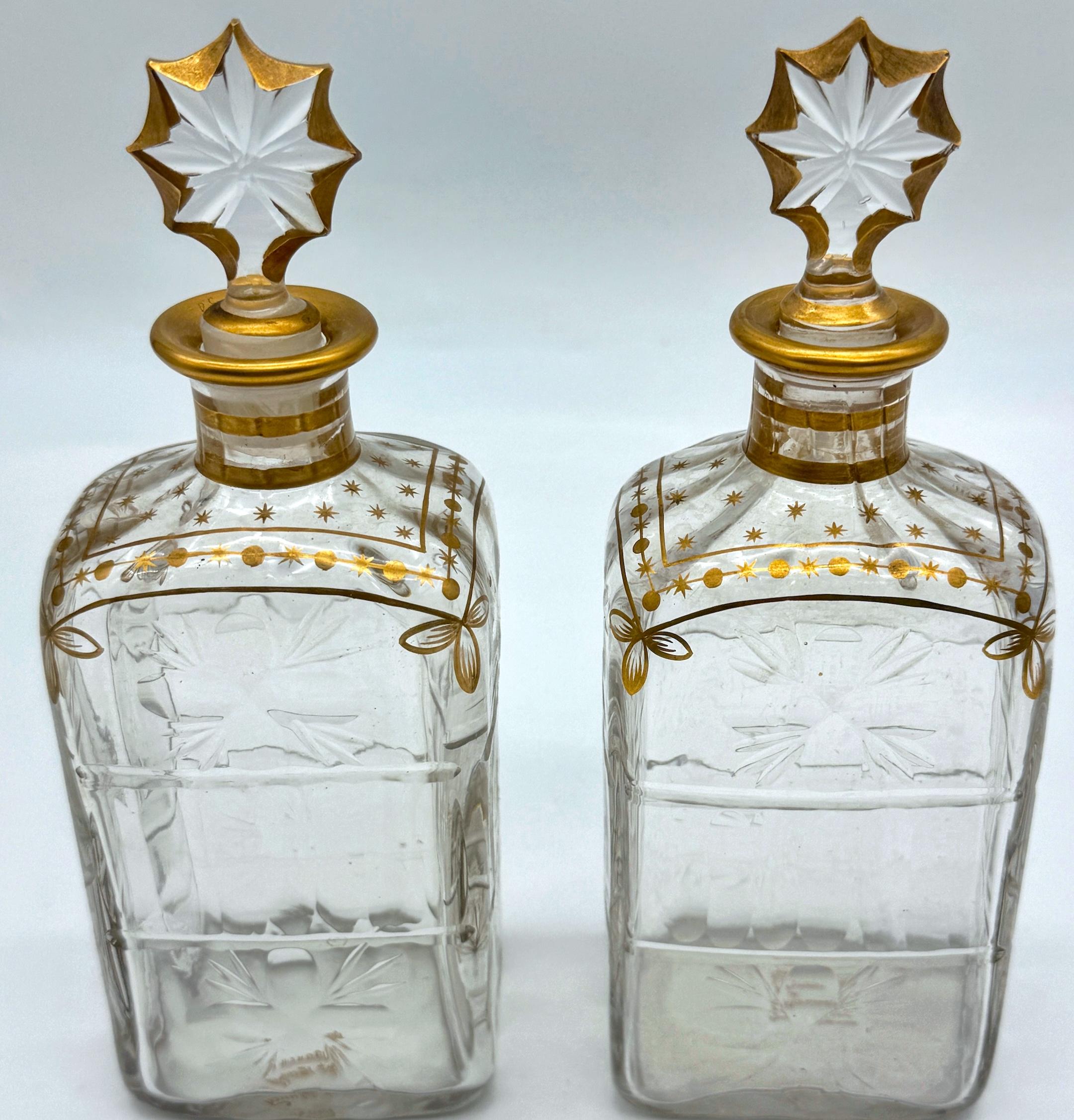 Pair of Early Daum Nancy Gilt and Wheel-Cut Crystal Decanters, Circa 1880–1895

This elegant pair of signed Daum Nancy decanters dates to the firm's early production period, circa 1880–1895, a time when the celebrated French glassmaker was producing