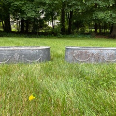 Pair of Early English Grey Lead Planters with Classical Decoration