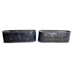 Pair of Early English Grey Lead Planters with Classical Decoration