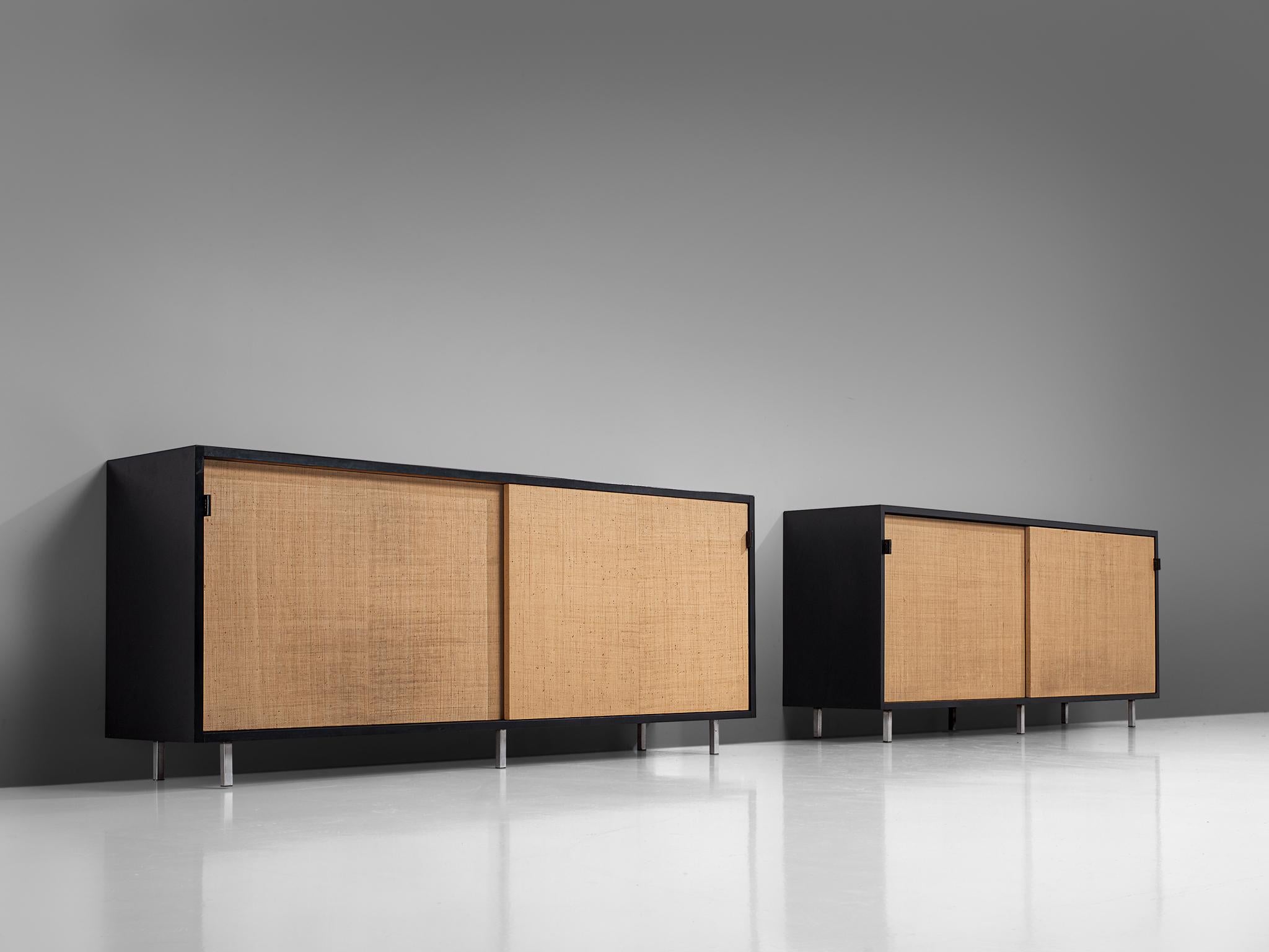 Florence Knoll for Knoll, pair of sideboards, cane, ebonized wood, and metal, United States, 1961.

These sideboards are designed by Florence Knoll for Knoll International and were meant for the headquarters of Knoll in Italy. The credenzas are