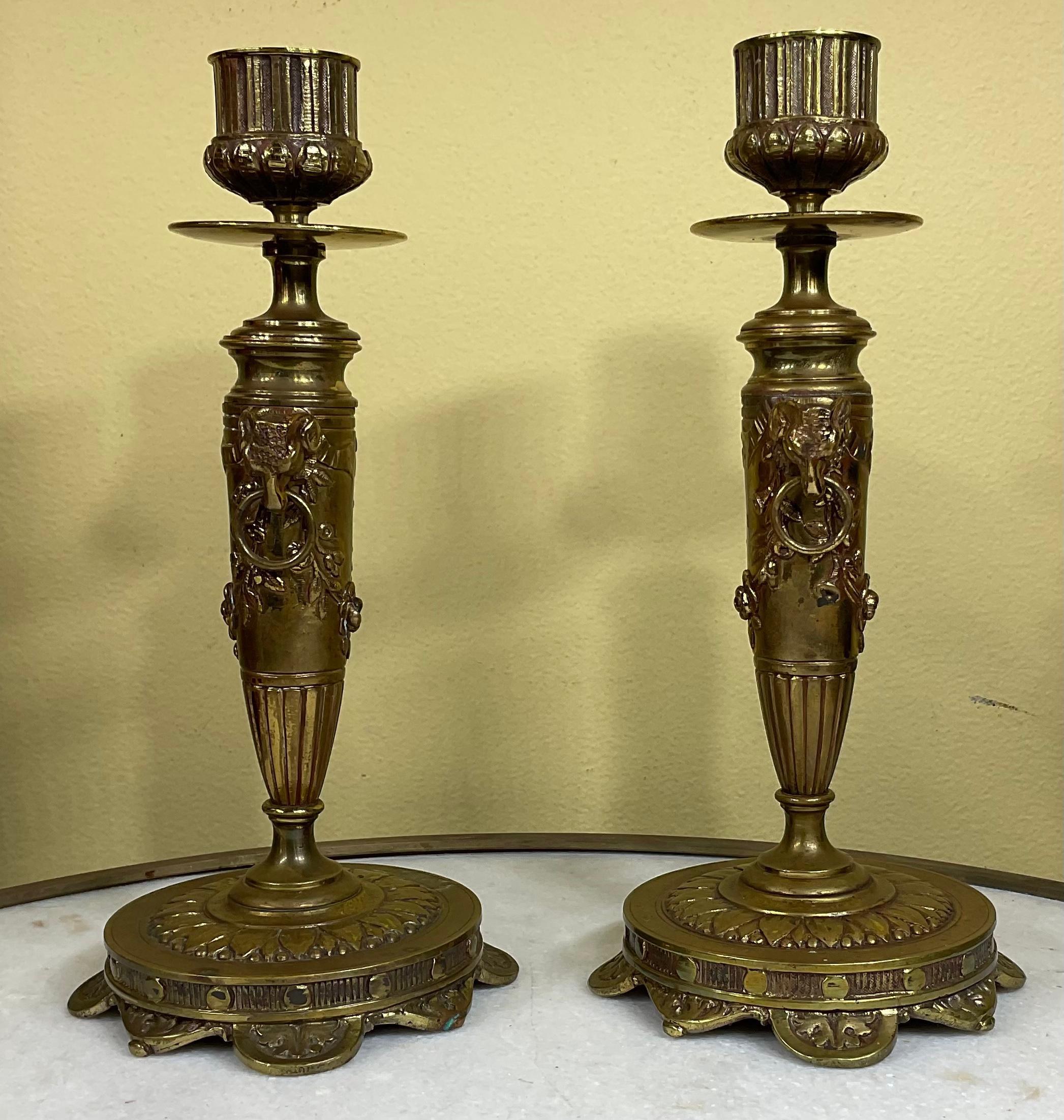 An unusual pair of French engraved low candlesticks with and delicately incised and decorated base , the middle has two rams head , and floral motif. original silvering under the base.
Excellent object of art for display.
 