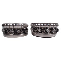 Pair of Early Georg Jensen Grapevine Silver Wine Bottle Coasters