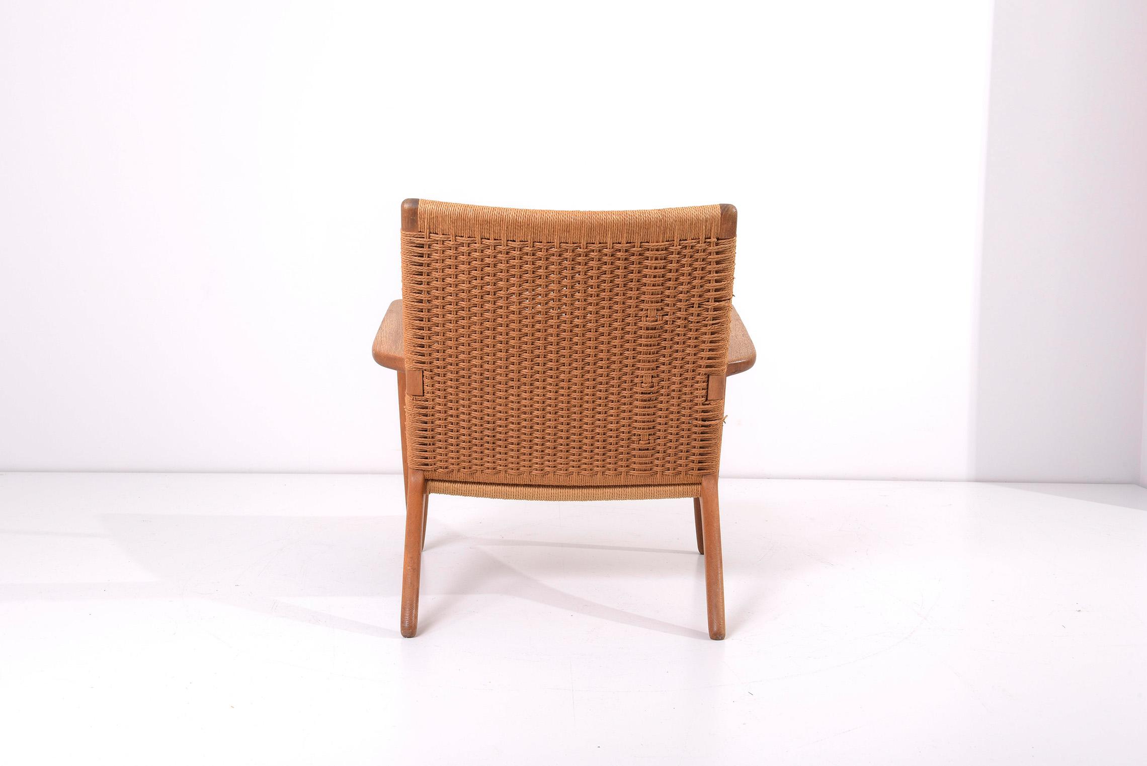 Pair of Early Hans J. Wegner Easy Chairs “CH 25” for Carl Hansen 1