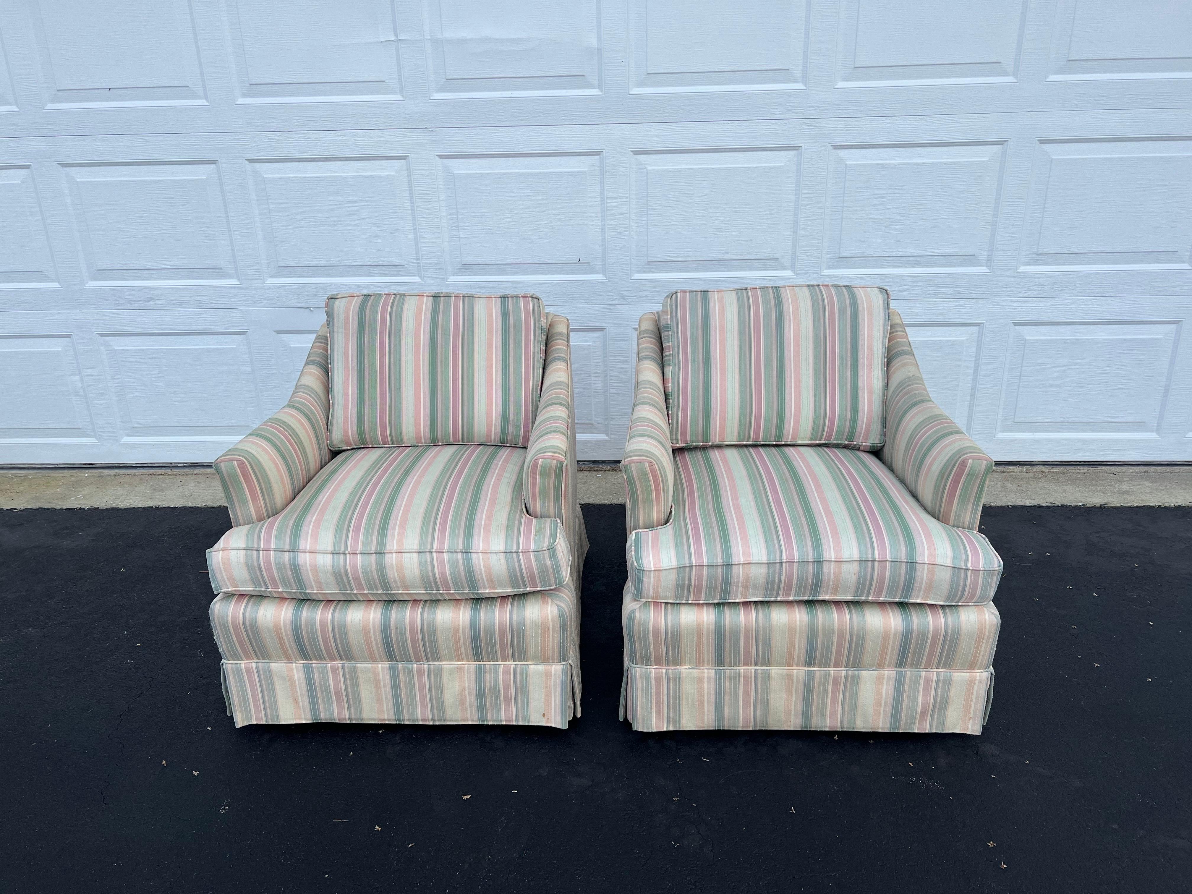 Pair of Early Henredon Swivel Club Chairs. Classic shape and style. Incredible rock solid construction. Structurally very sound. See photos of the solid wooden base. They just don't make them like they used to . This is when furniture was made in