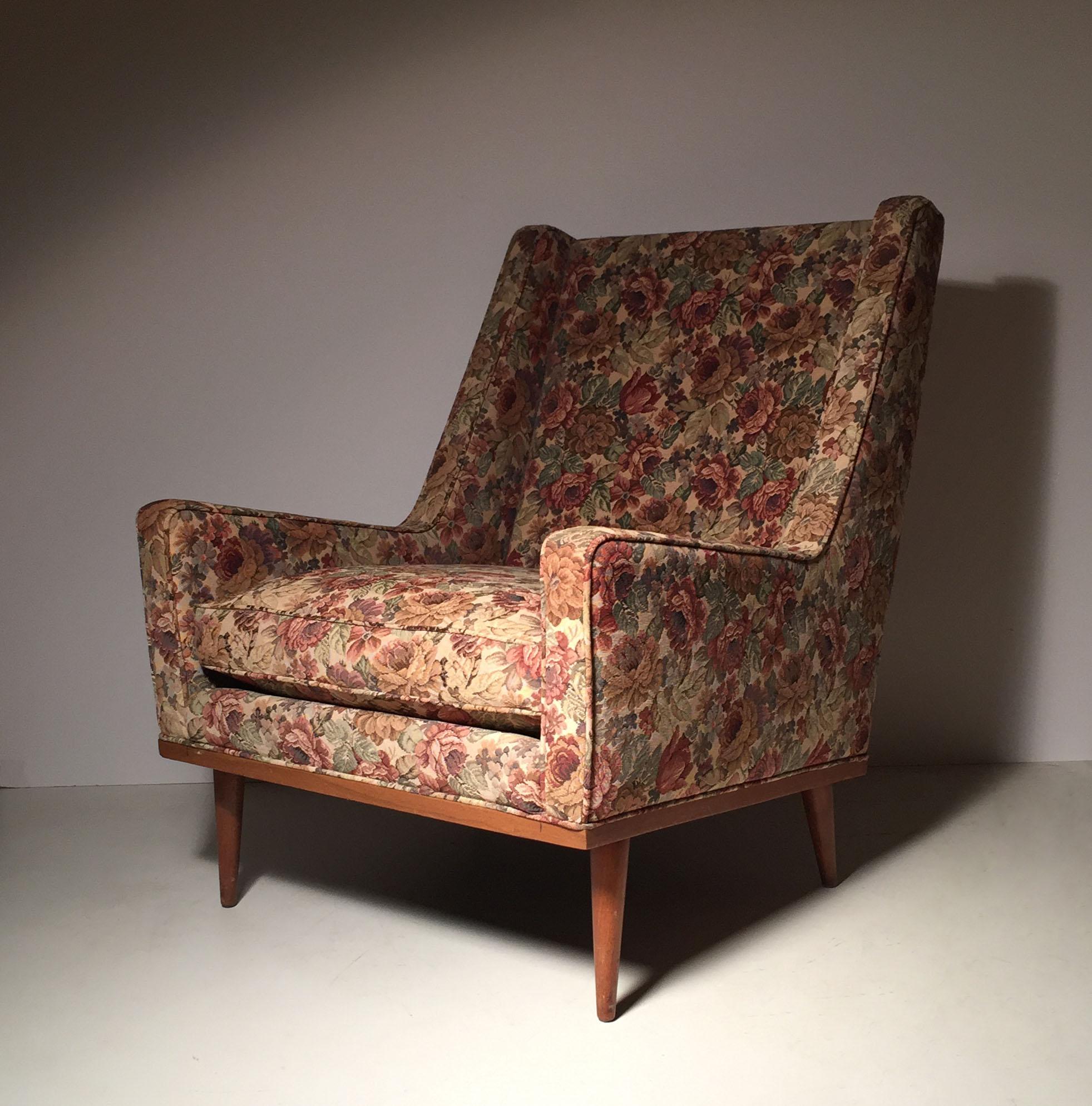 A nice early pair of designer chairs by Milo Baughman. Were reupholstered sometime in the 1980s-1990s. If the floral fabric is desirable then I believe the condition of fabric as-is is in good shape. Otherwise would be nice to reupholster. Plus