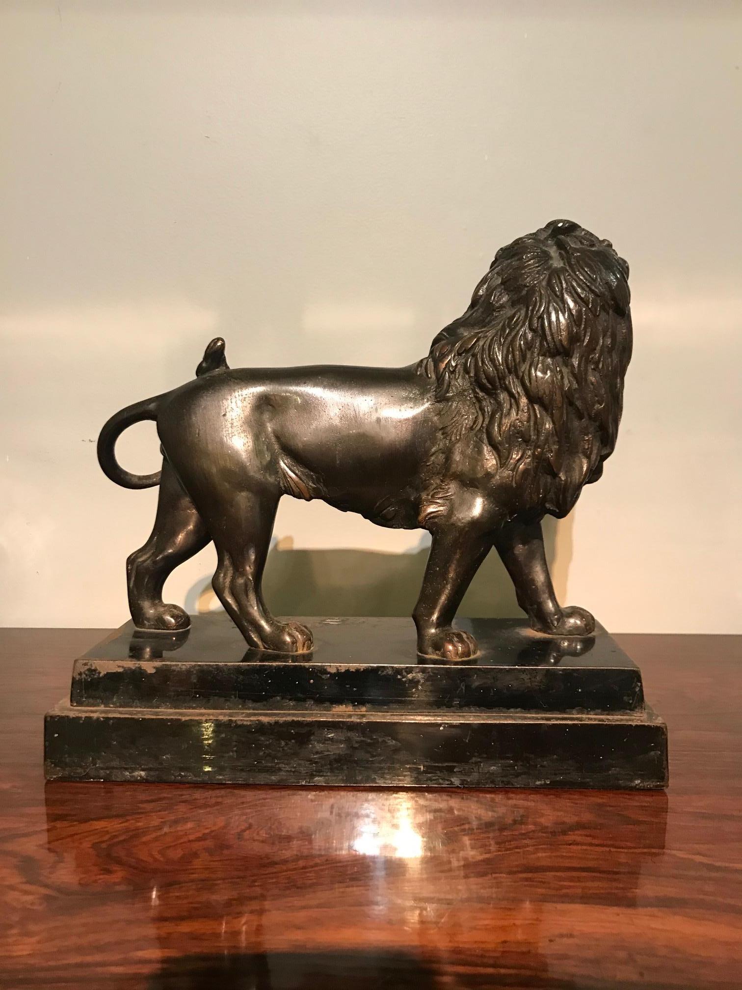 Pair of Early 19th Century Regency Cast Iron Lion Sculptures In Good Condition In London, GB