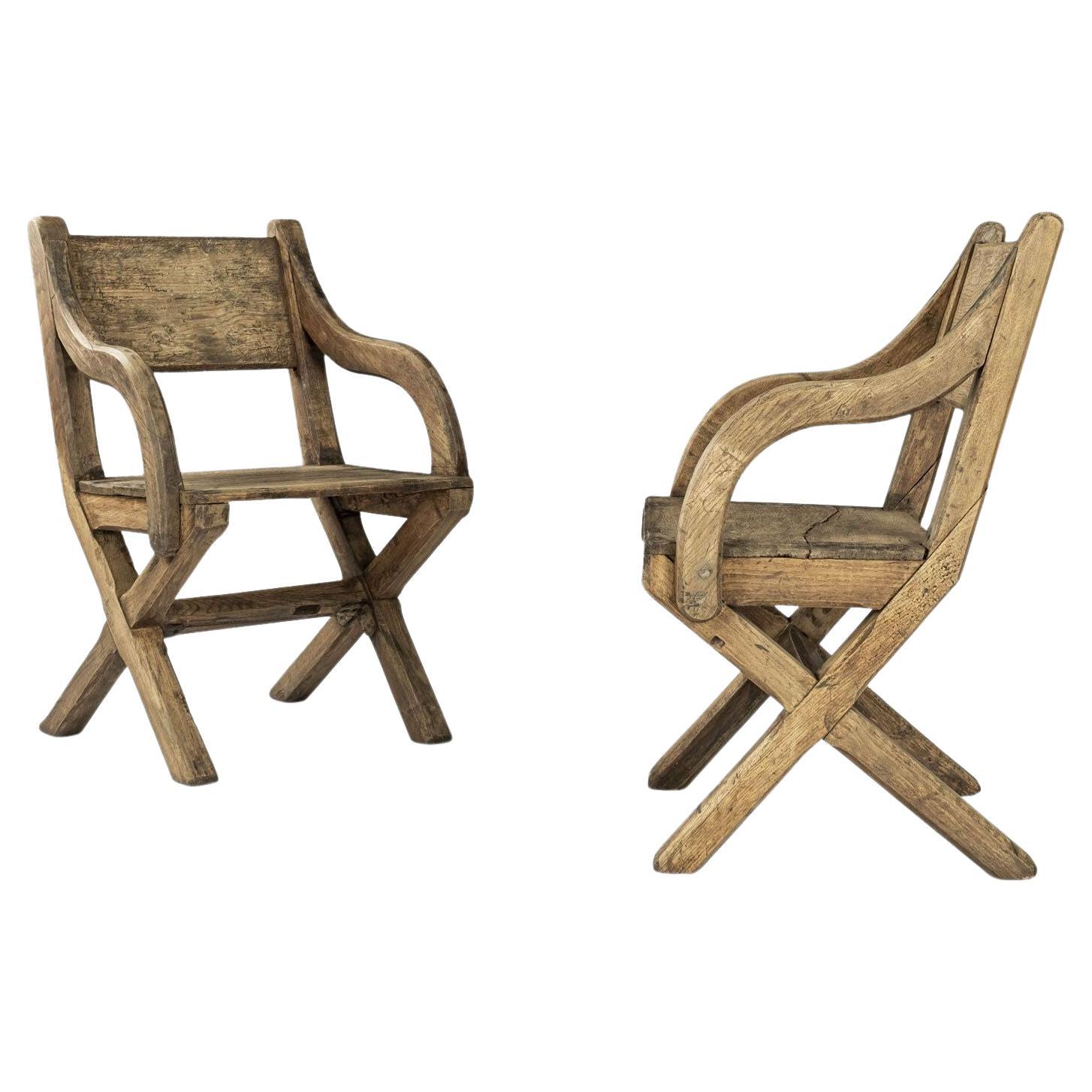 Pair of Early Oak X-frame Armchairs