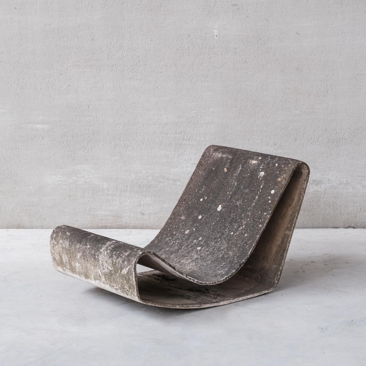 A pair of 'Loop' lounge/garden chairs by Willy Guhl for Eternit AG.

A continuous sheet of concrete, these have aged amazingly, and remain in perfect condition. 

Switzerland, c1950s. 

Price is for the pair. 

Rare model to find in such