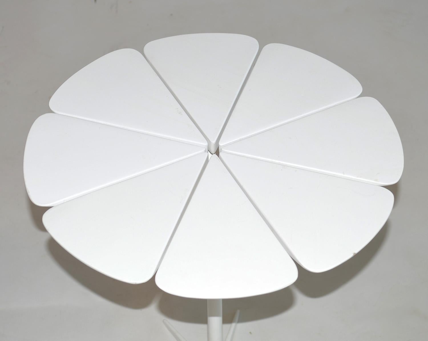 Pair of early Richard Schultz Petal tables by Knoll, 1960's in white lacquer tops with enameled bases. Early Knoll label. Color varies due to sun exposure. Price is for pair.
 