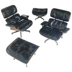 pair of Early Rosewood Eames Lounge Chairs with Ottomans for Herman Miller