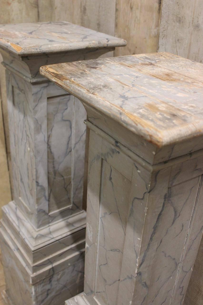 A good and useful pair of early to mid-20th century faux marble plinths in painted wood, that will work well in either a classic or contemporary setting.
 