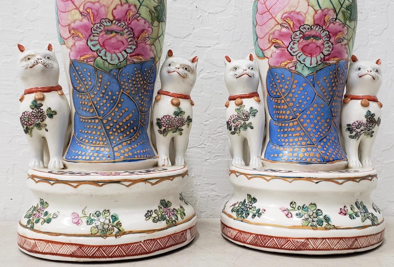 Pair of early to mid-20th century Chinese Porcelain figurines with cats

Fantastic pair of Chinese export hand painted porcelain figurines with cats.

We are unsure what these were originally used for. Possibly candleholders.

Each piece