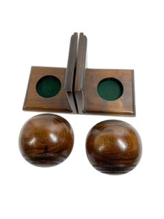 Pair of Early Twentieth Century Lignum Vitae Lawn Bowl on Custom Bookend Stands