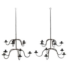 Pair of Early Two-Tier Forged Iron Chandeliers