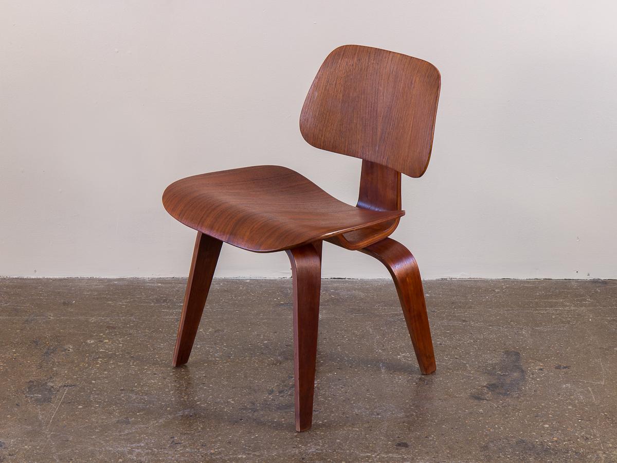 Mid-Century Modern Pair of Early Walnut Eames DCWs Dining Chair Wood for Herman Miller For Sale