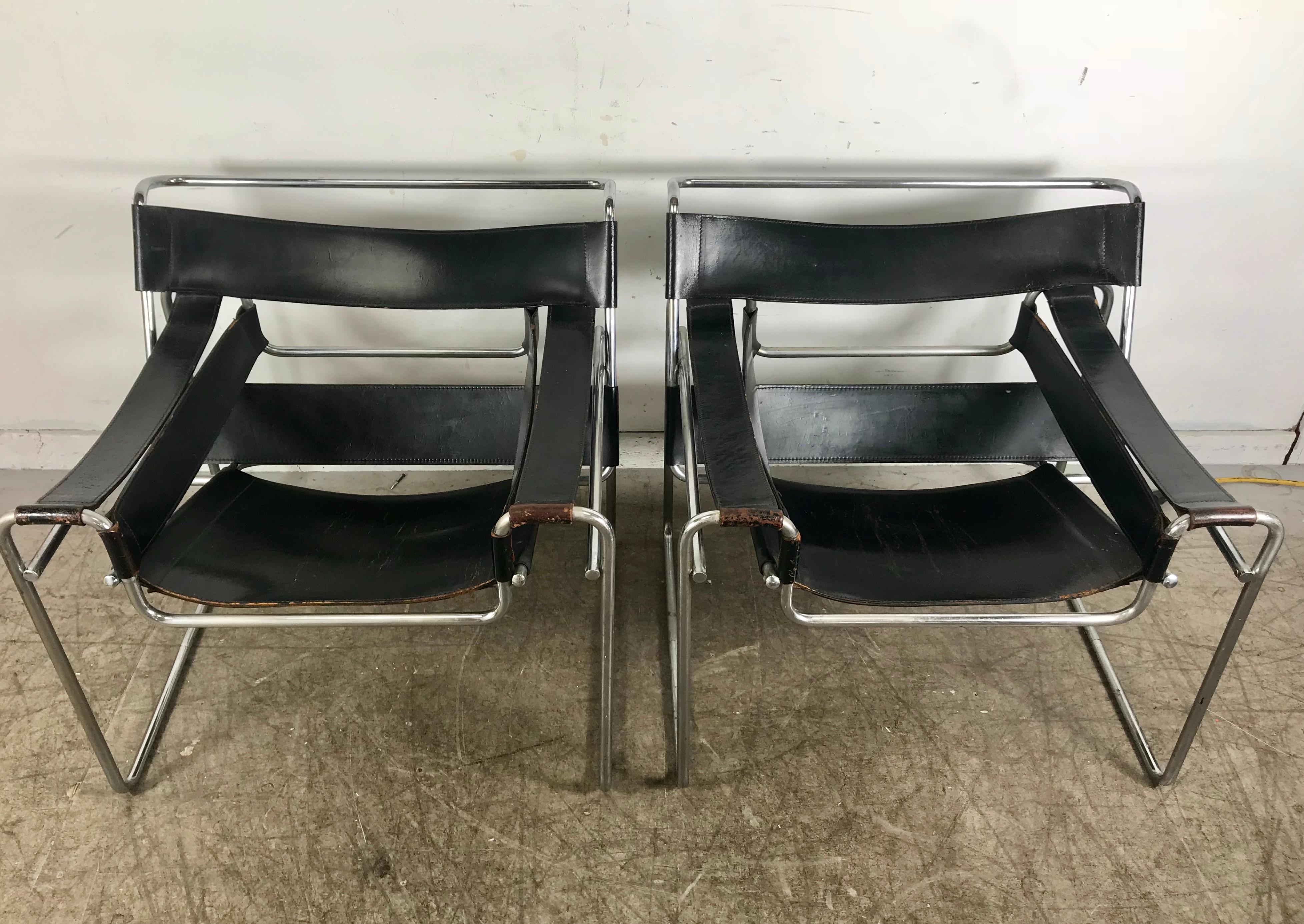 Marcel Breuer's 1925 design is a widely recognized masterpiece of modern furniture, having long ago achieved iconic status. This pair of Wassily chairs date to the 1960s.
The chromed steel frames are finely finished and have considerable heft. The