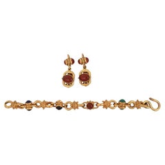 Pair Of Earrings And A Bracelet With Gemstones