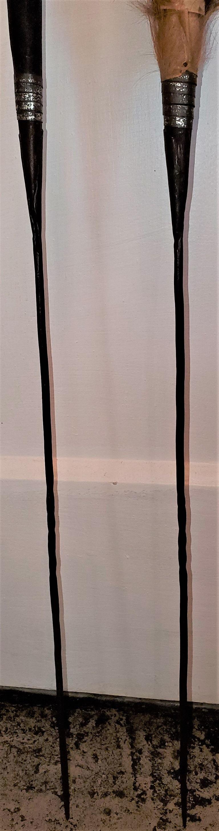 Presenting a very rare vintage mid-20th century pair of East African Throwing Short Spears.

Made of iron and wood and covered in traditional animal fur (probably antelope).

Probably made in Sudan or Kenya in the 1950s.

The spear end is