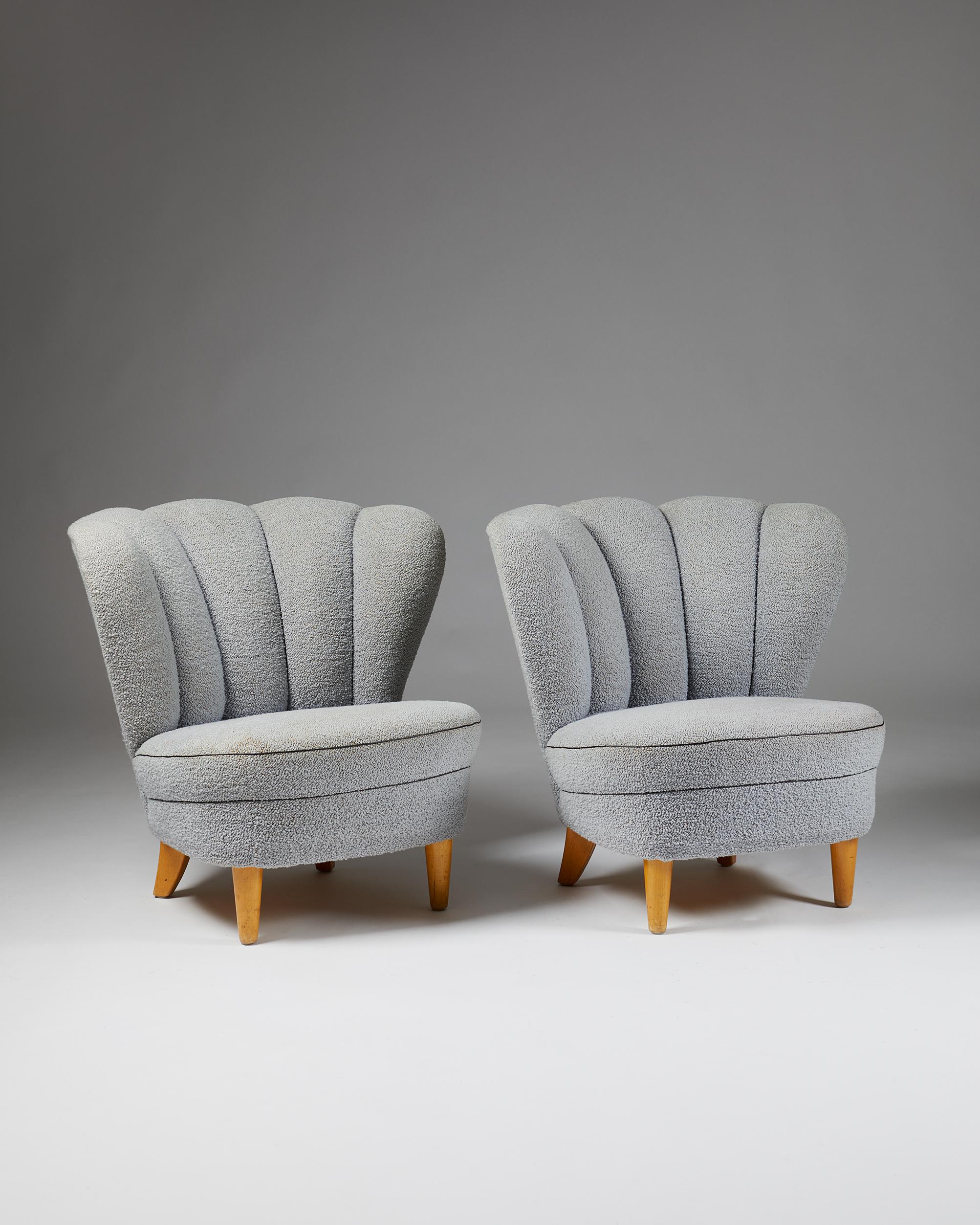 Pair of easy chairs, anonymous,
Finland. 1950's.

Birch and upholstery.

Measurements: 
H: 68 cm/ 2' 2 3/4