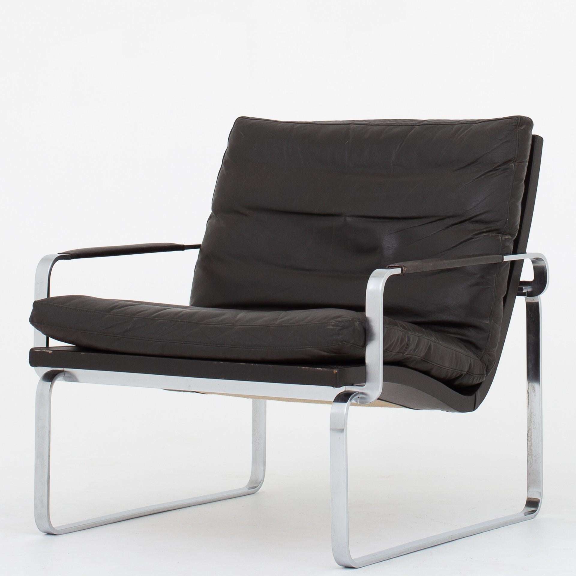 Two BO 91 - Easy chairs in original dark brown leather w. frame in chromed steel. Maker BO-EX.