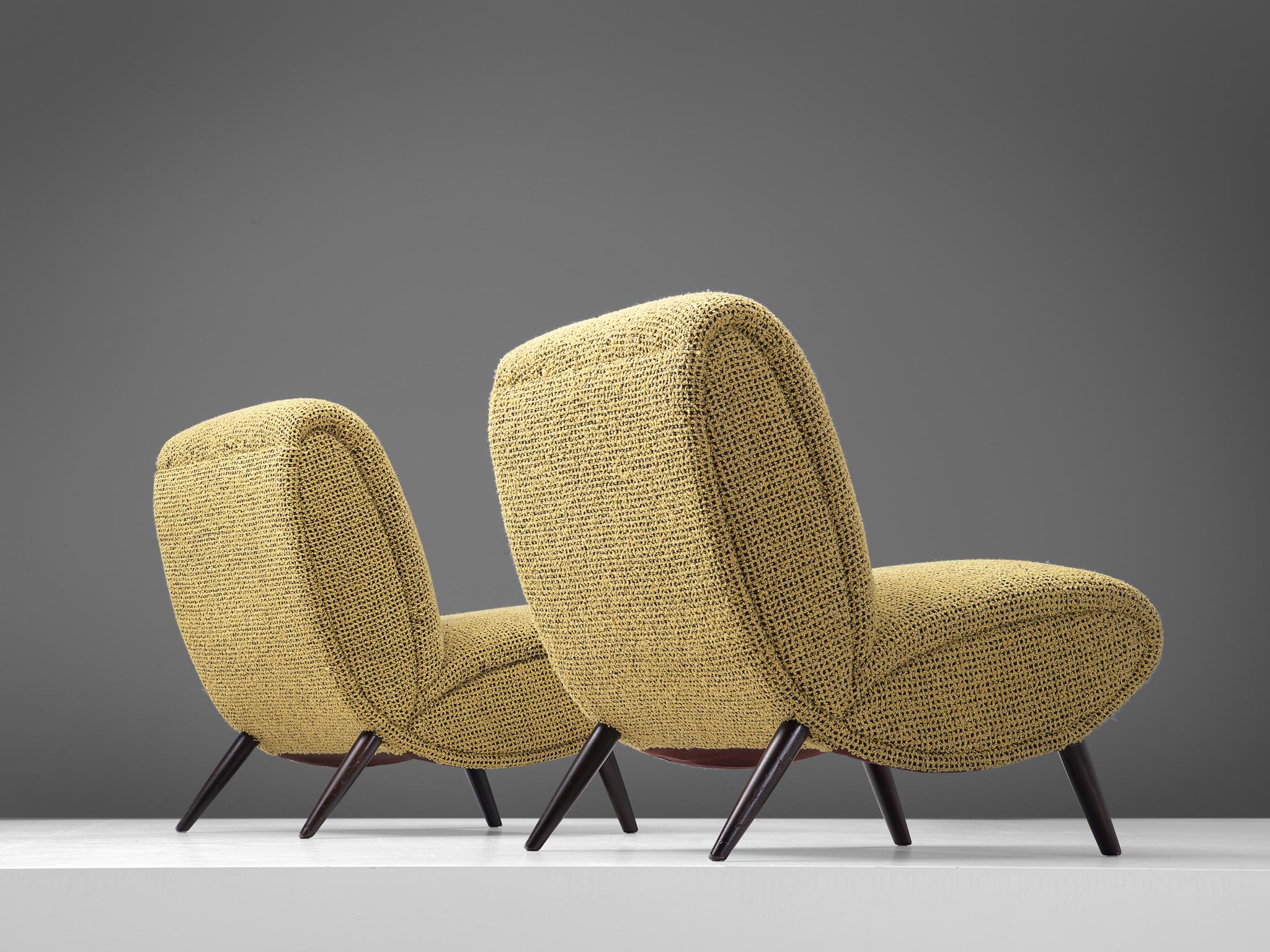 Norman Bel Geddes, set of two slipper chairs, fabric and beech, United States, 1949.

Set of two easy chairs designed by the American Industrial designer Norman Bel Geddes (1893-1958). In his book 'Horizons' (1932) he describes his design