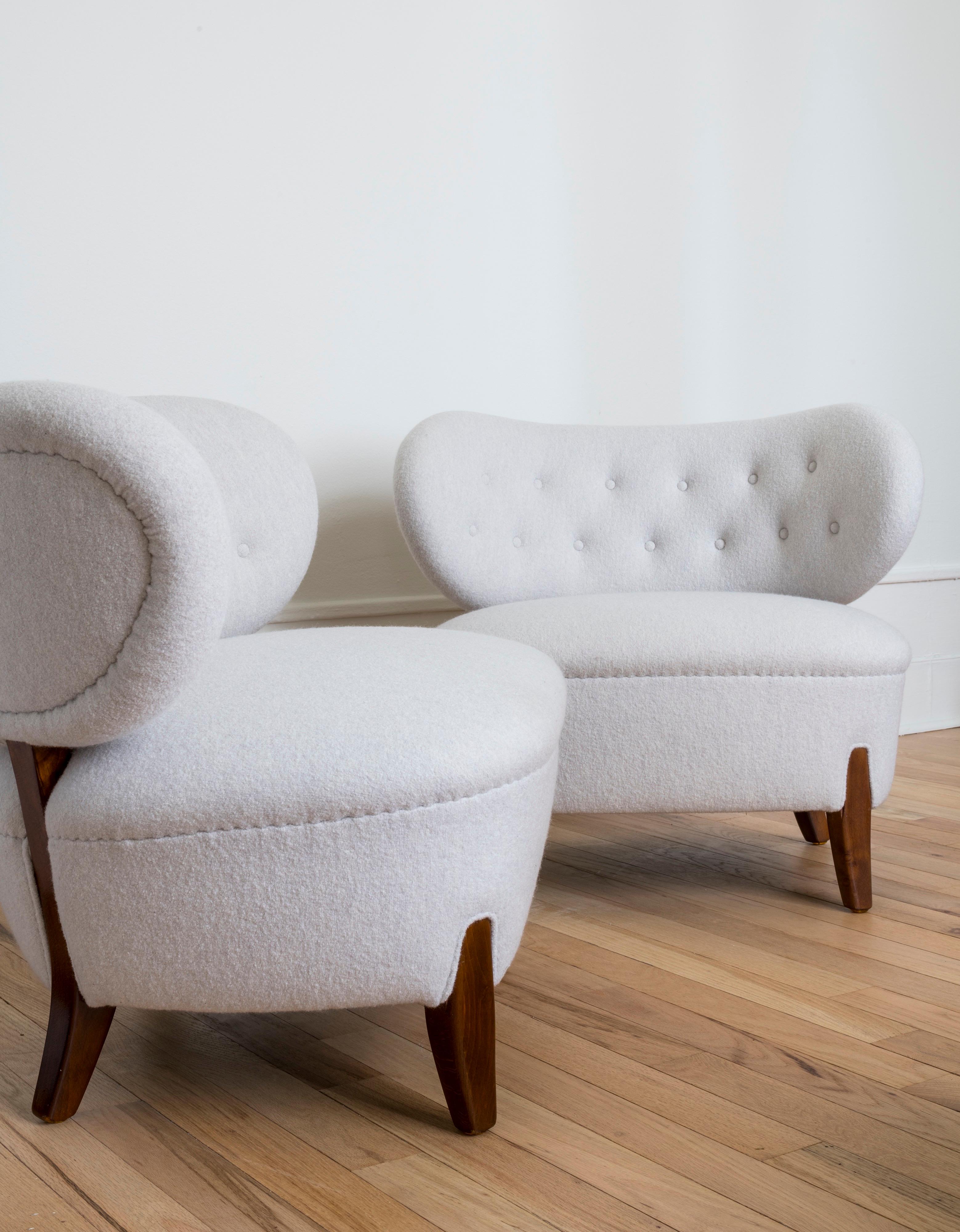 Pair of easy chairs designed by Otto Schulz in 1936 (1882-1970) and produced by Boet

Seat and back are newly upholstered in wool

Made in Sweden.