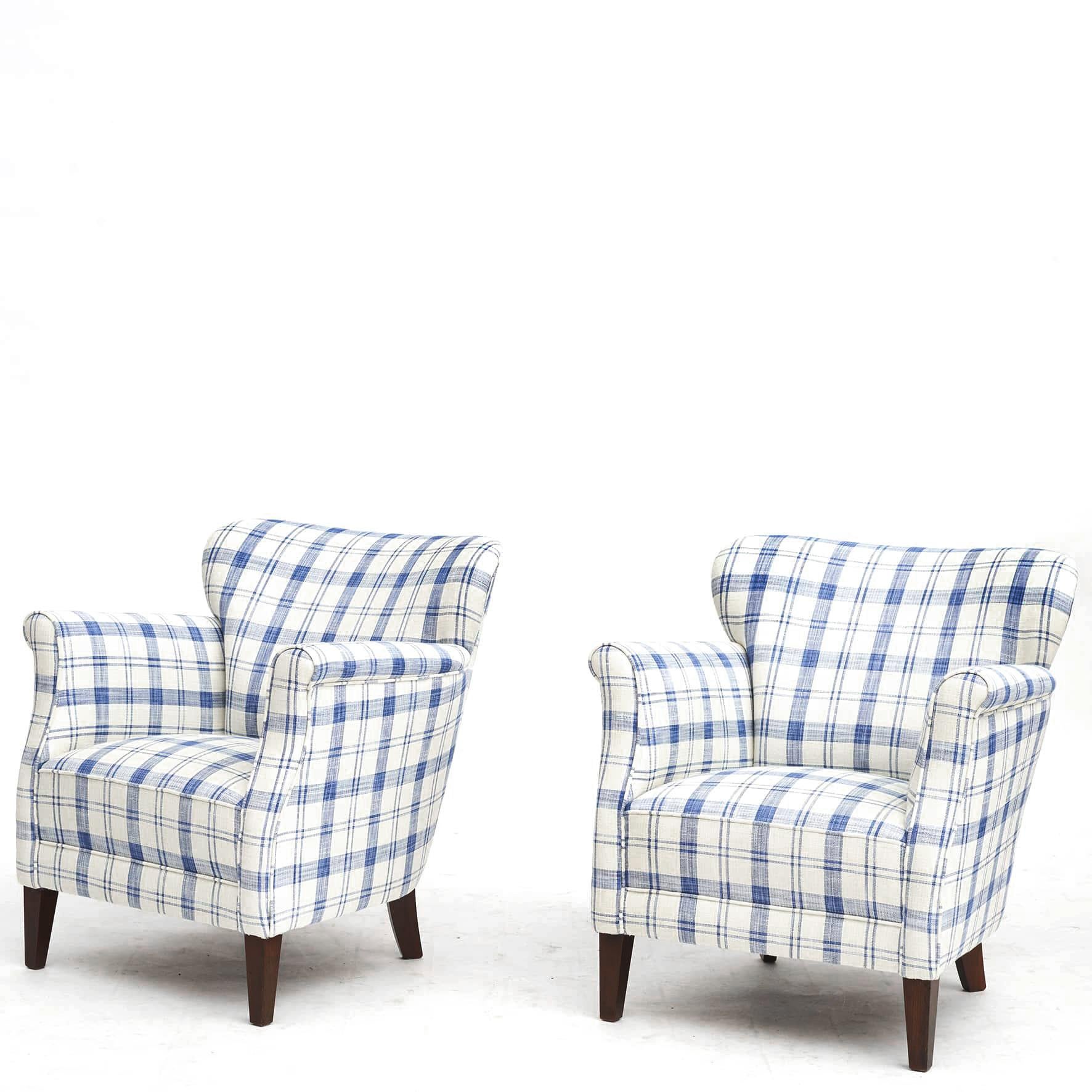 Pair of Danish armchairs c. 1950.
Newly upholstered in a blue and white checkered pattern fabric from 