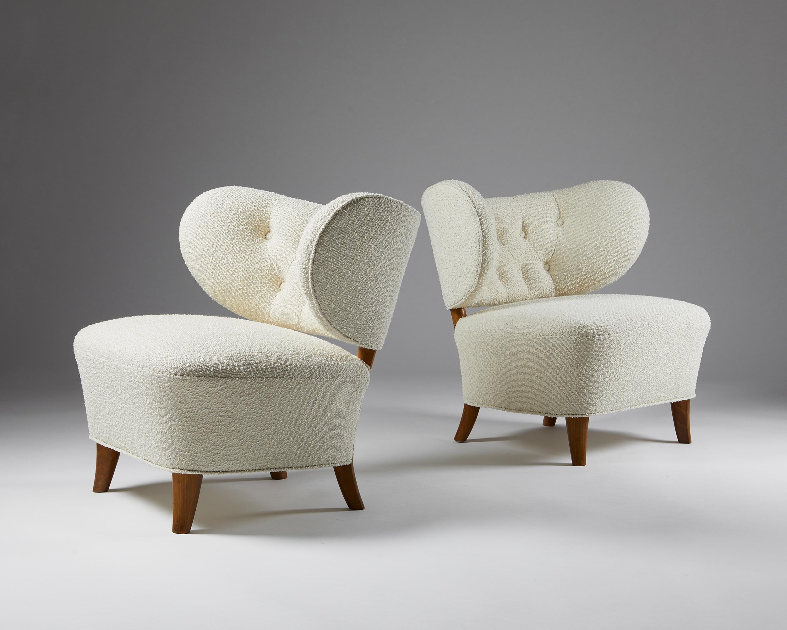 Pair of easy chairs designed by Otto Schulz for Boet,
Sweden, 1940s.

Wool upholstery and lacquered wood.


This Schulz model is one of the designer’s rarest and finest chairs. Both chairs are newly reupholstered in the most luxurious Boucle fabric