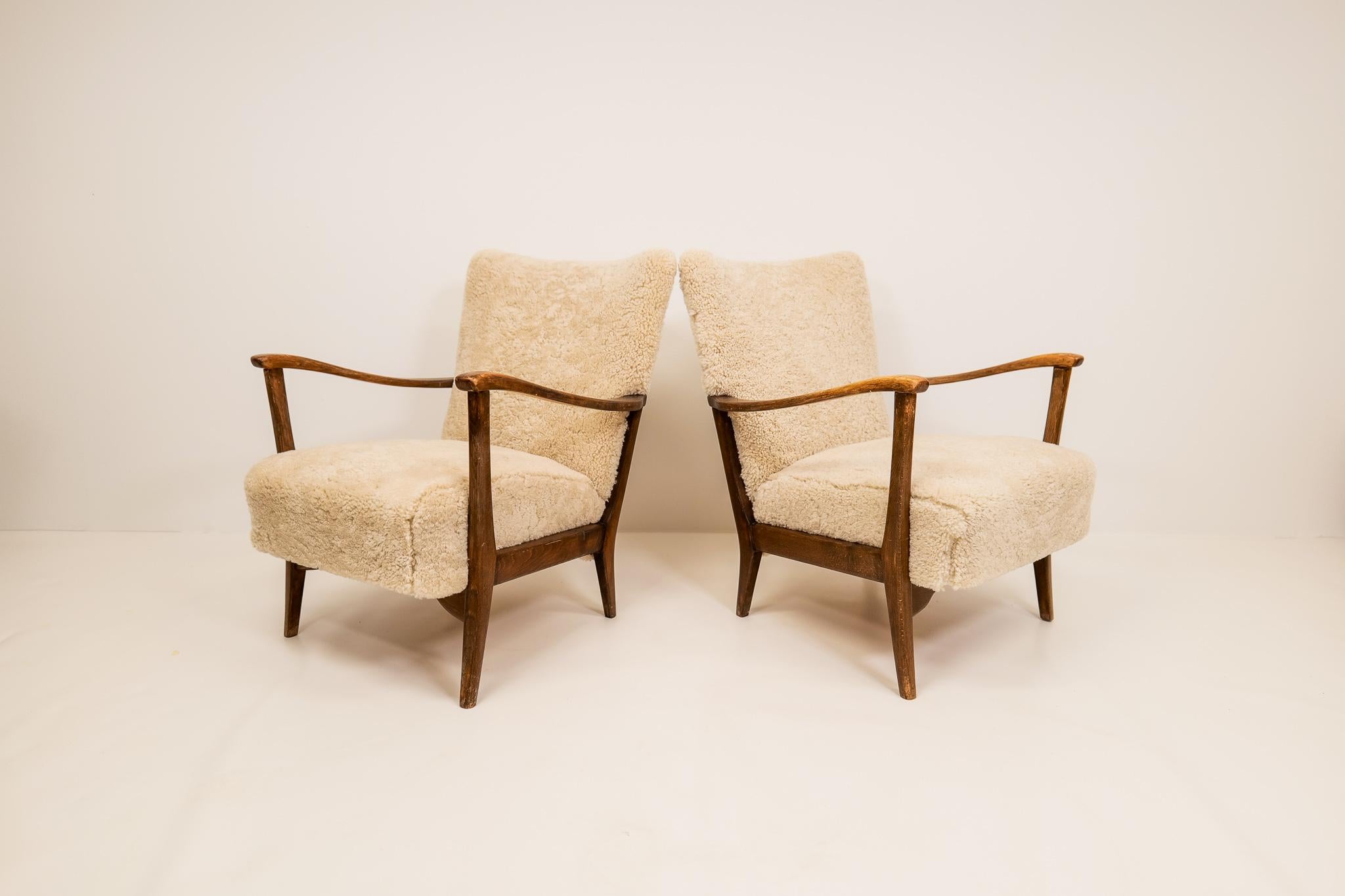 Swedish Pair of Easy Chairs DUX in Sheepskin, Sweden, 1950s