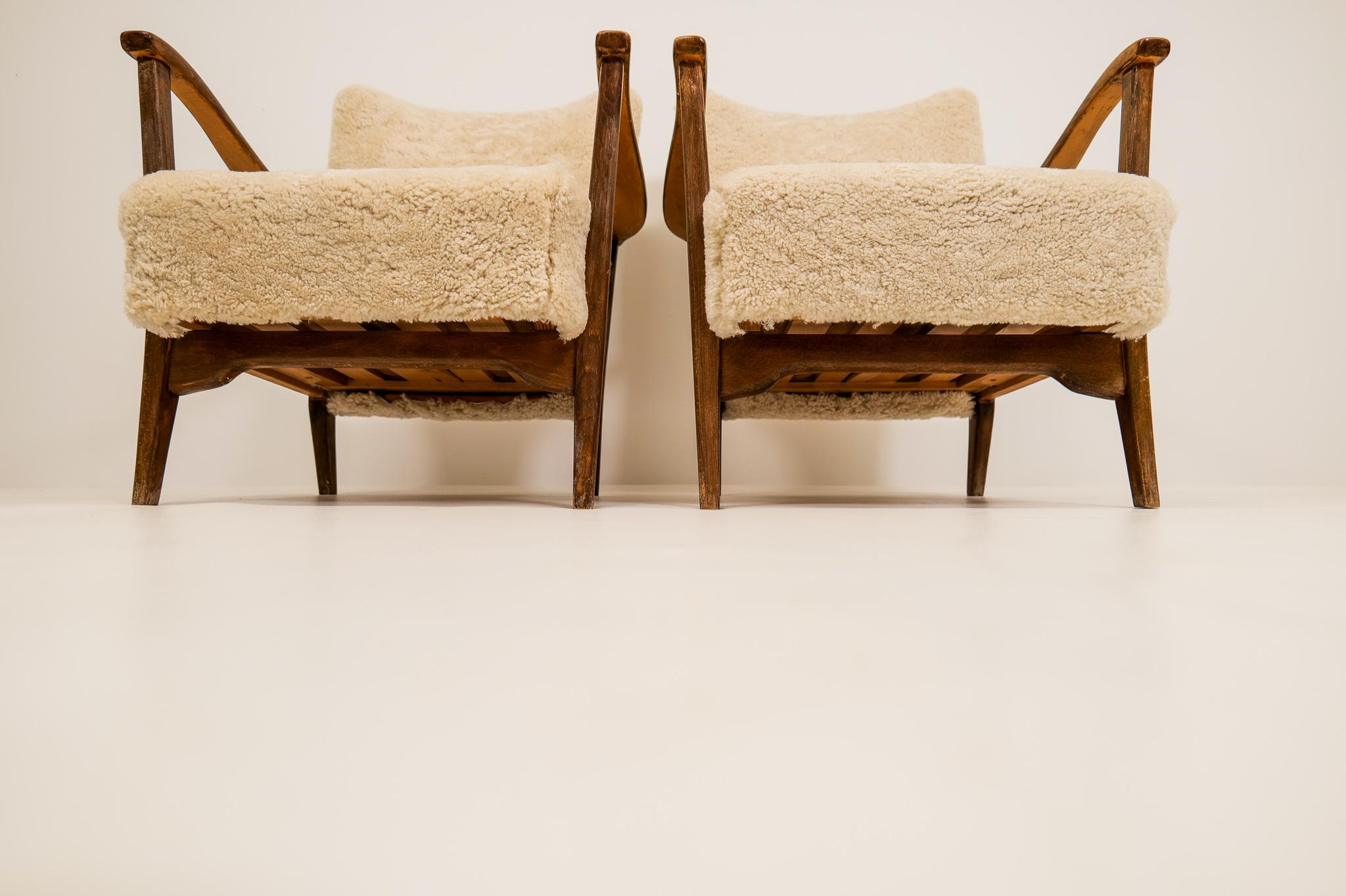 Pair of Easy Chairs DUX in Sheepskin, Sweden, 1950s In Good Condition In Hillringsberg, SE