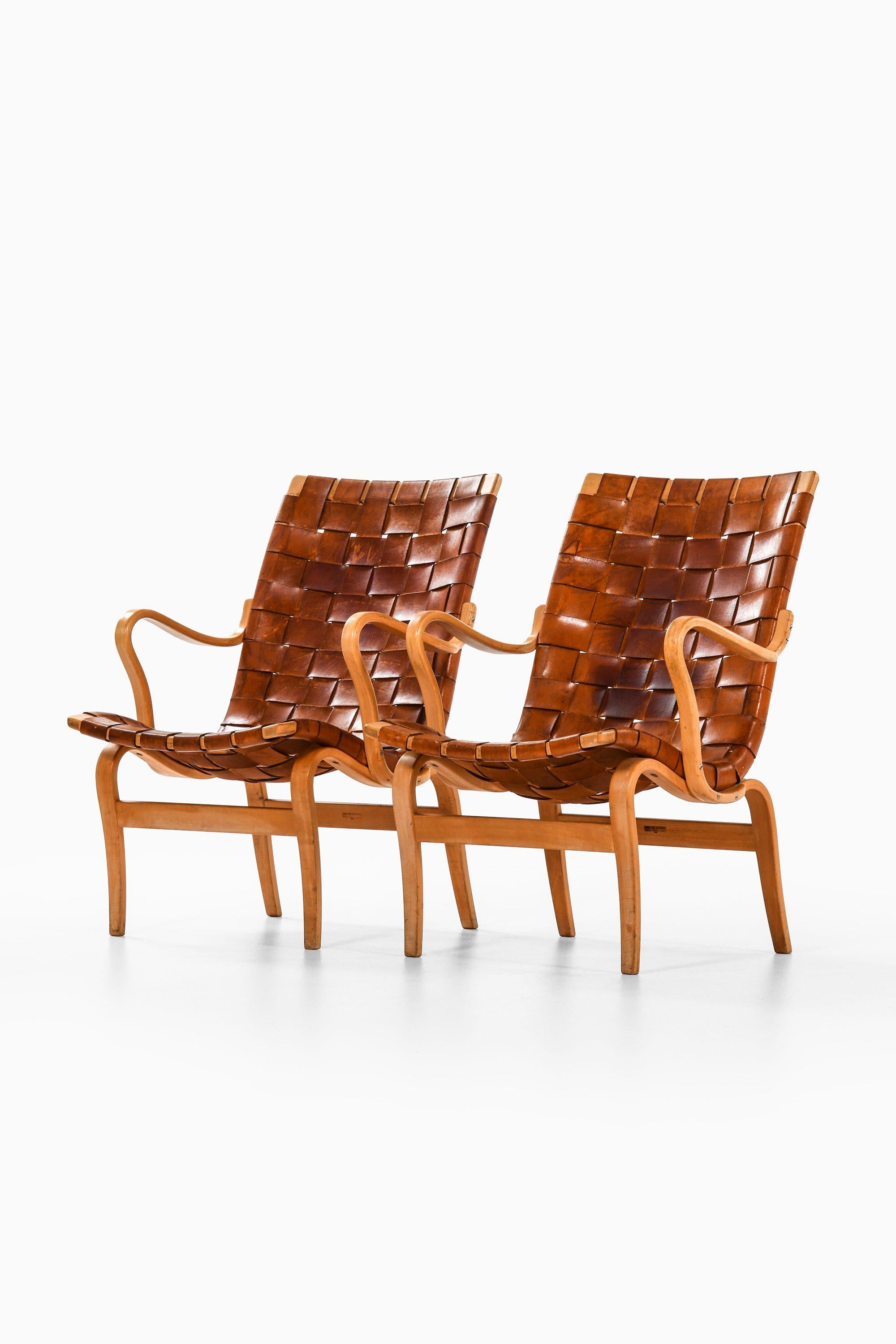 Suédois Paire de fauteuils en bouleau et sangles en cuir d'origine de Bruno Mathsson, 1968 en vente