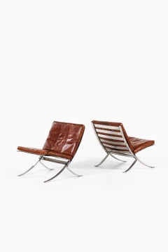 Coppia di poltrone in acciaio cromato e pelle di Steen Østergaard, anni '60