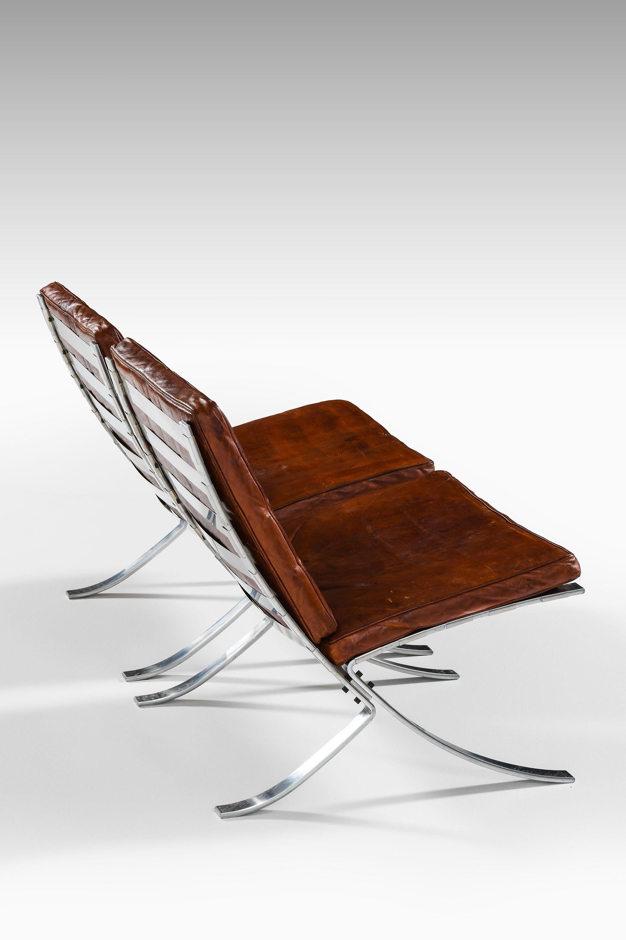 Paar Sessel aus verchromtem Stahl und Leder von Steen Østergaard, 1960er Jahre (Dänisch) im Angebot