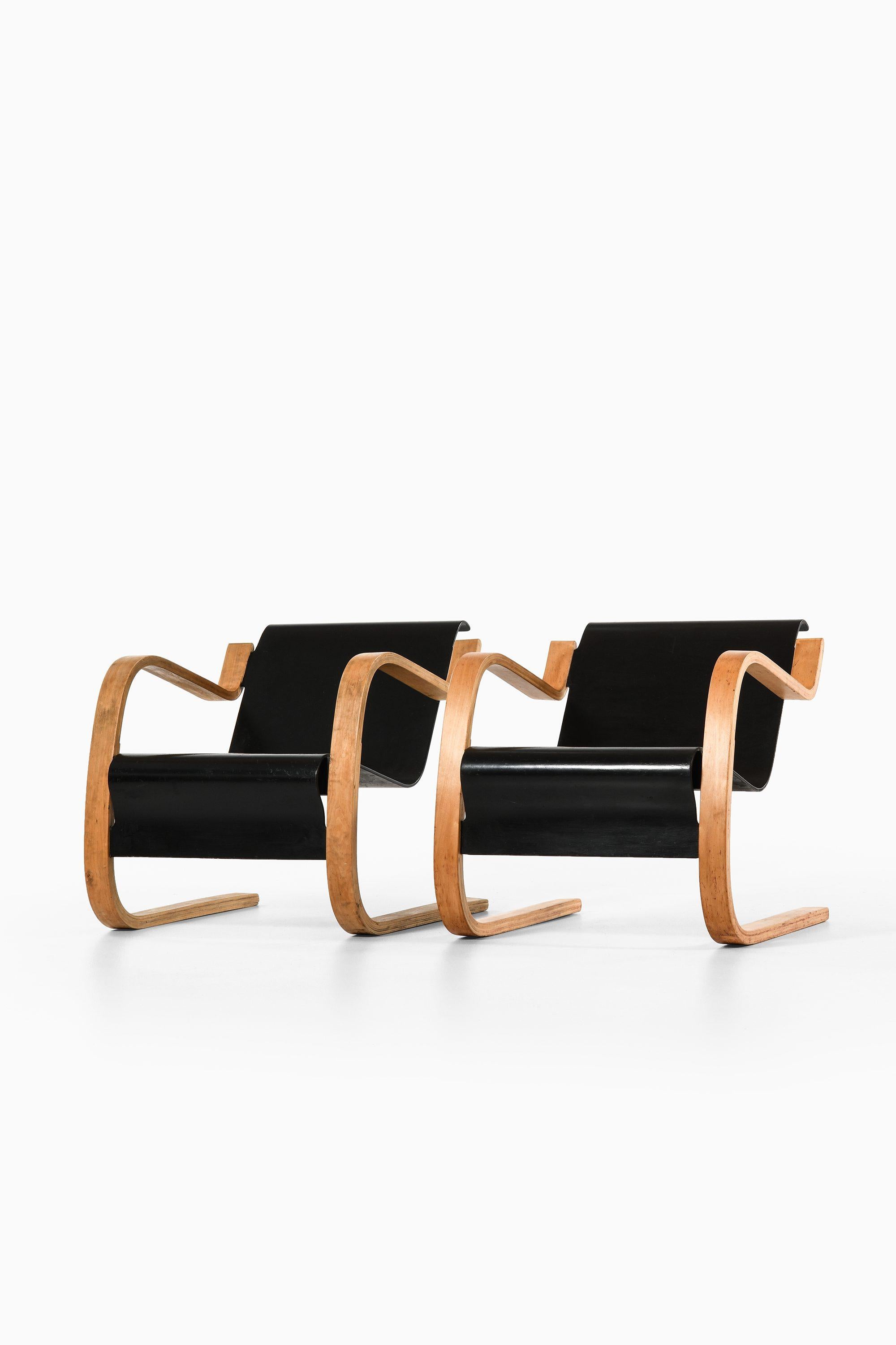 Mid-Century Modern Paire de fauteuils en bouleau moulé et stratifié par Alvar Aalto+Aalto, années 1940 en vente