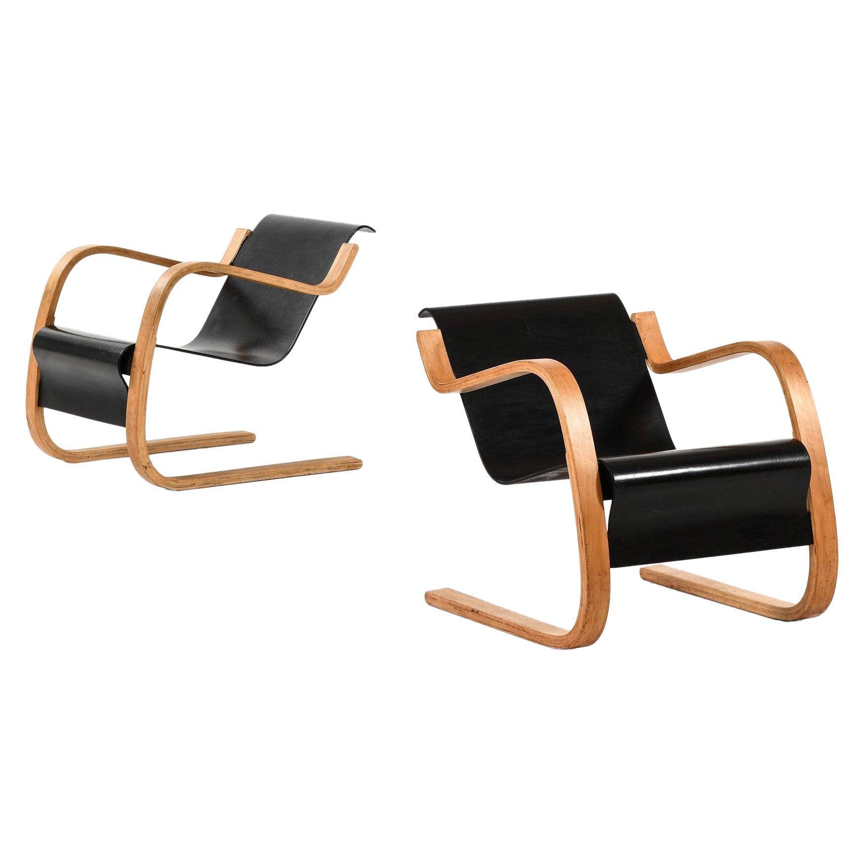 Paire de fauteuils en bouleau moulé et stratifié par Alvar Aalto+Aalto, années 1940 en vente