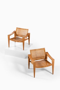 Paar Sessel aus Eiche, Rohrgeflecht, Messing und Leder von Hans Wegner, 1959