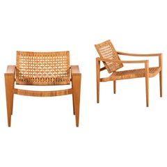 Paire de fauteuils en chêne, canne tressée, laiton et cuir par Hans Wegner, 1959