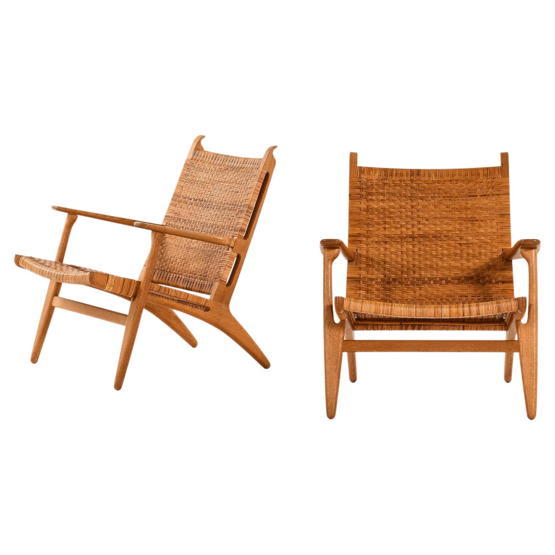 Coppia di poltrone in Oak, canna intrecciata di Hans Wegner, 1949
