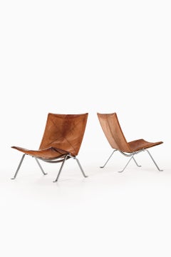 Pair of Easy Chairs in Original Leather and Steel by Poul Kjærholm, 1950s