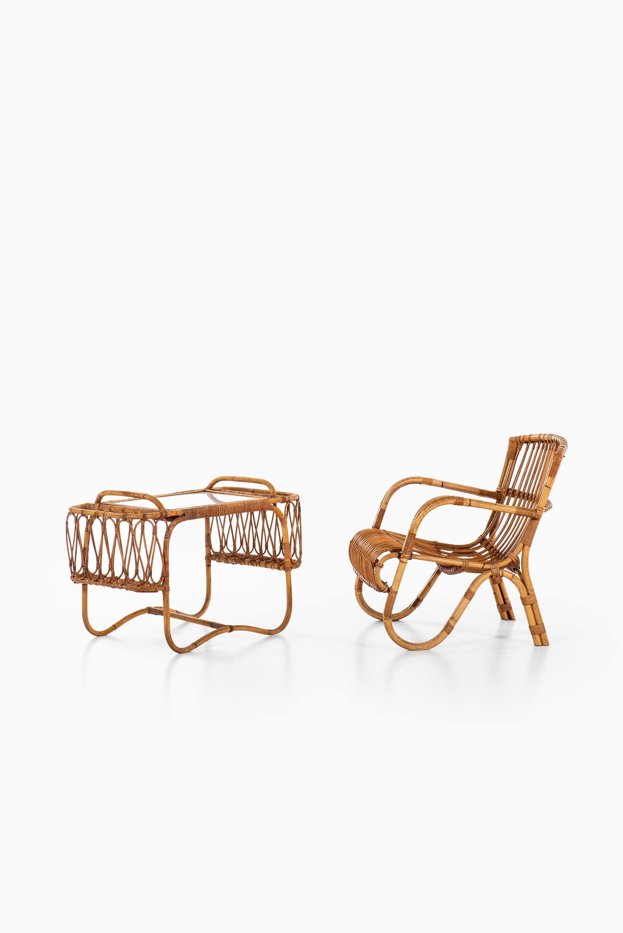 Pair of Easy Chairs in Rattan and Cane by E.V.A. Nissen & Co in Denmark 1