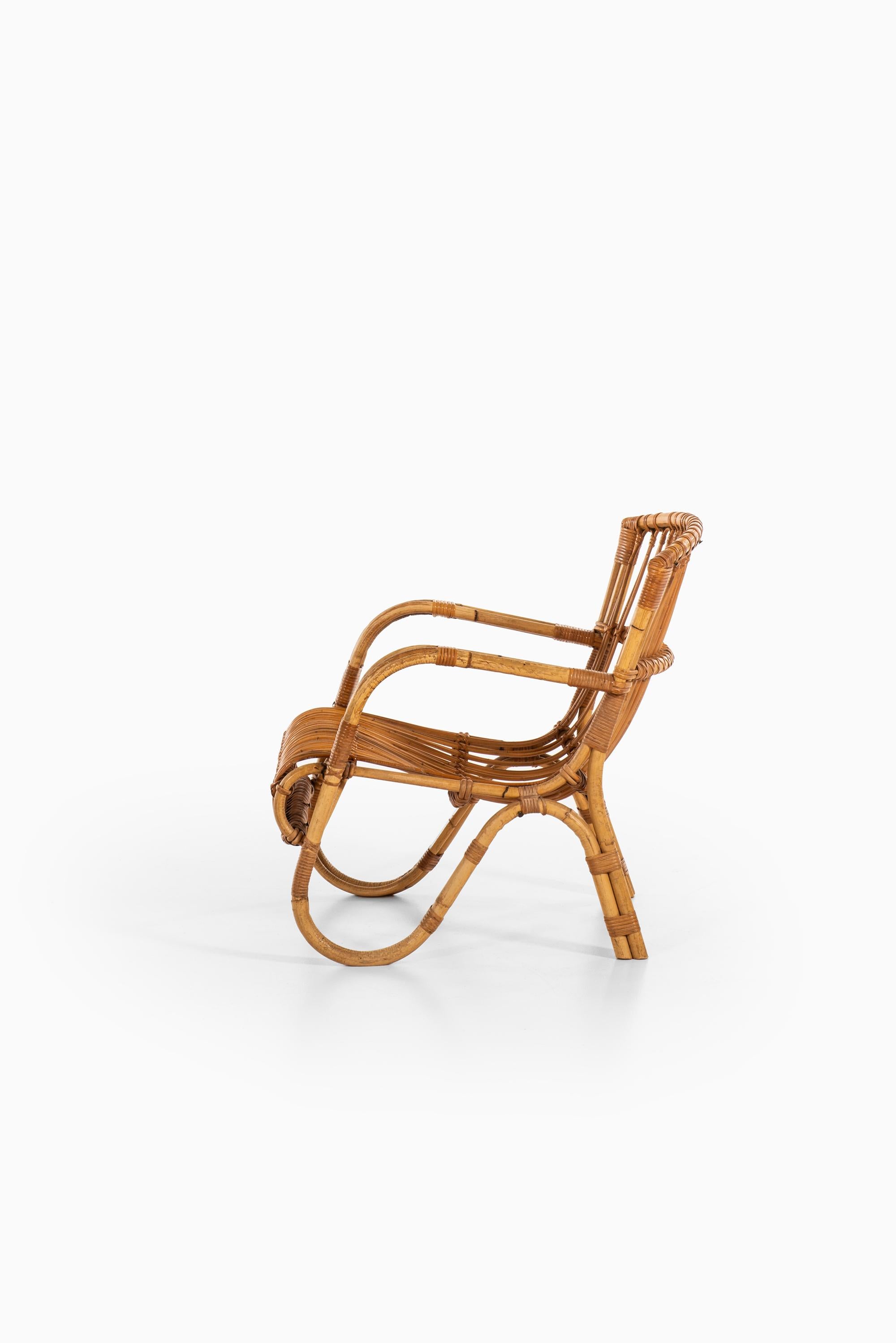 Pair of Easy Chairs in Rattan and Cane by E.V.A. Nissen & Co in Denmark 2