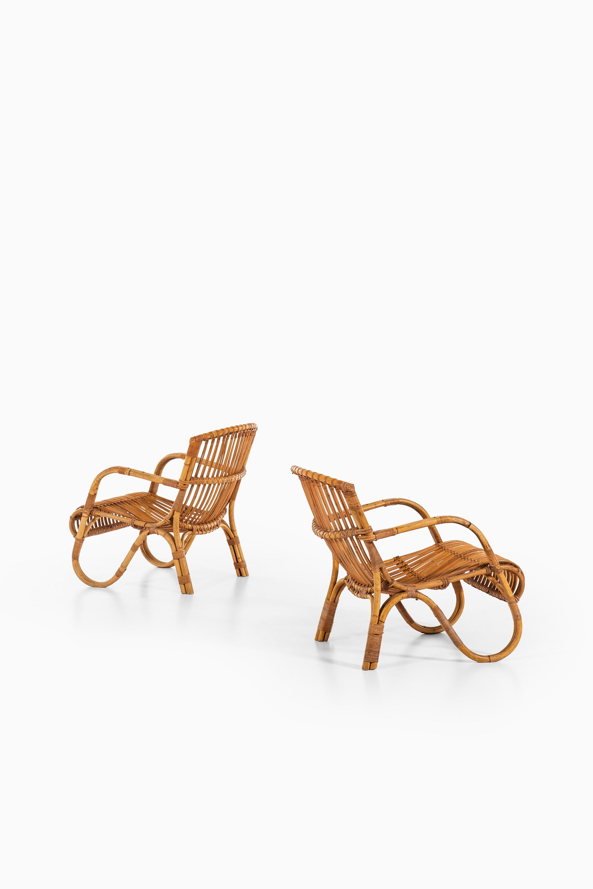 Pair of Easy Chairs in Rattan and Cane by E.V.A. Nissen & Co in Denmark In Good Condition In Limhamn, Skåne län