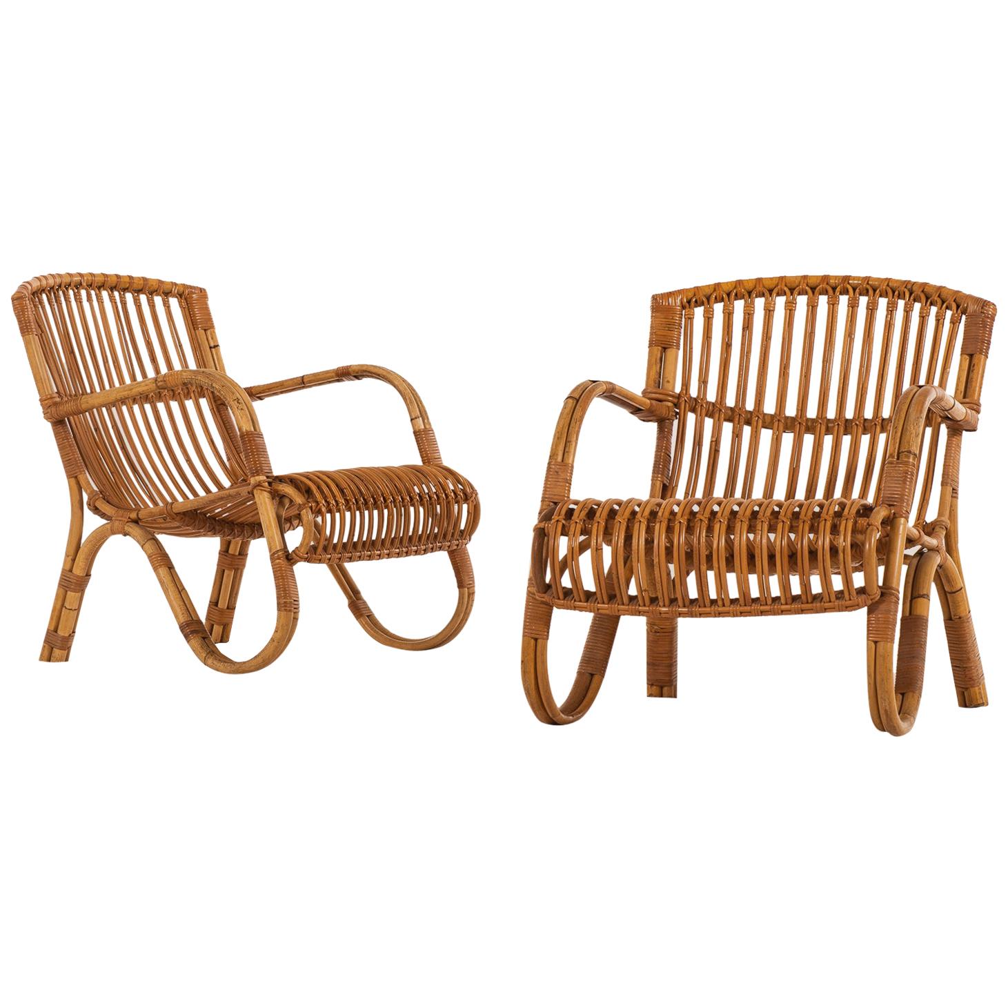 Pair of Easy Chairs in Rattan and Cane by E.V.A. Nissen & Co in Denmark