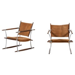Easy Chairs aus Palisanderholz und Stahlgestell von Jens Harald Quistgaard, 1960er Jahre, Paar